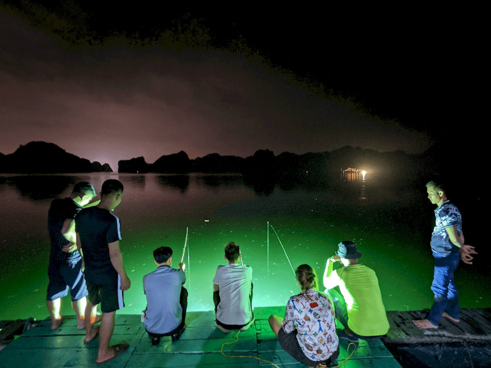 Squid fishing can be an unique memory for many travelers at Cat Ba Island 